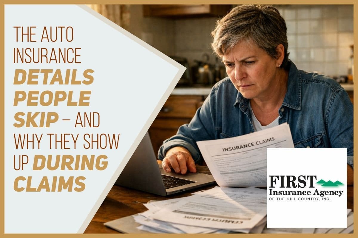 Person reviewing auto insurance policy documents at a kitchen table with a laptop